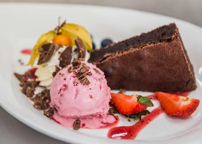 Den Gyldne Hane Estalagem